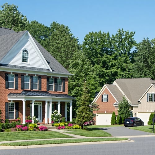 The image depicts a suburban neighborhood in DeKalb County showcasing a variety of residential properties In the foreground a large wellmaintained singlefamily home with a manicured lawn and a twocar garage stands out The house features a modern arch