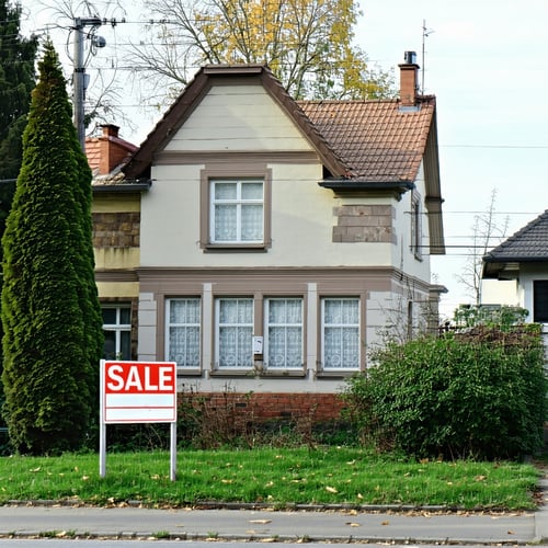 house for sale with signage
